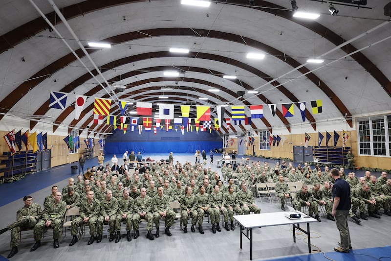 Jesse Daily speaks to a big crowd of U.S. Naval officer candidates in Newport, Rhode Island.
