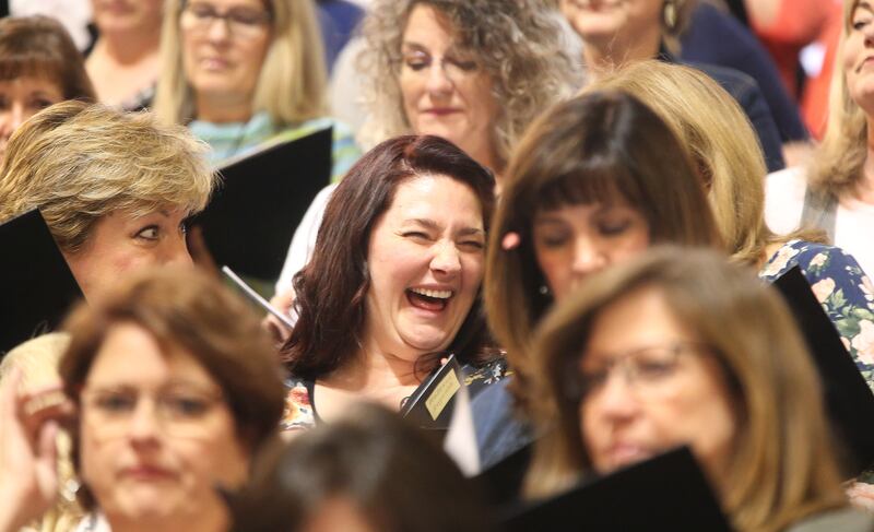 McKenna Reynolds laughs while rehearsing with The Tabernacle Choir at Temple Square during a rehearsal in Salt Lake City on Thursday, April 11, 2019. Four people were selected through social media to sing with the choir.