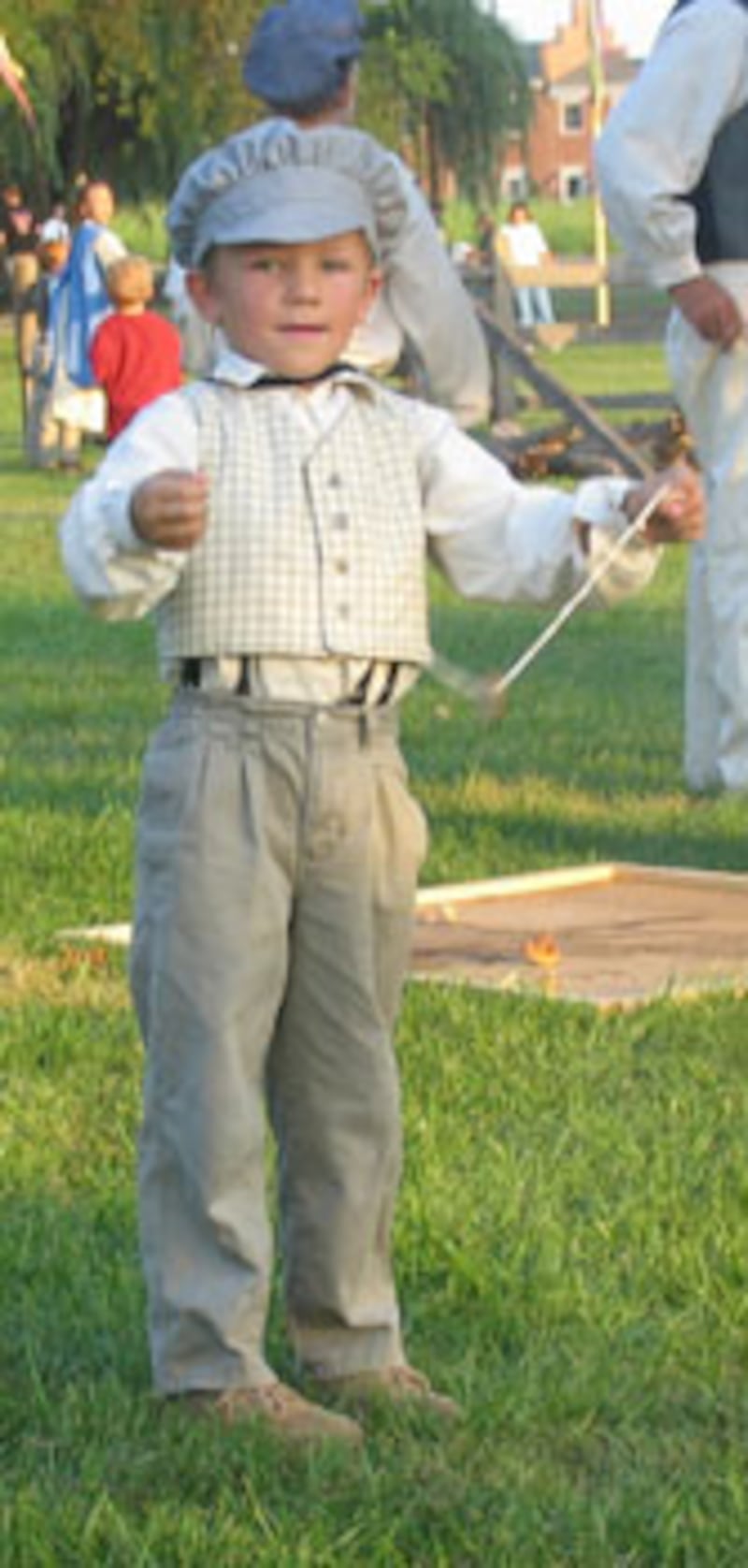 Joseph Stowell engages in pioneer game as part of pre-show.
