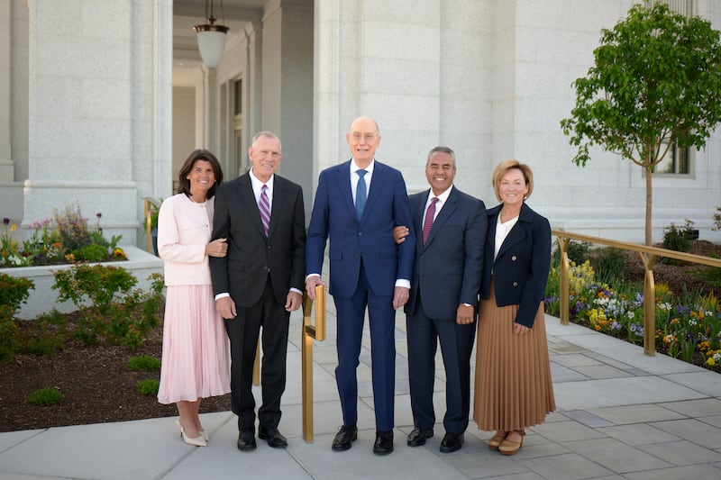 At center, President Henry B. Eyring, first counselor in the First Presidency, is joined at left by by Elder Steven R. Bangerter, General Authority Seventy and executive director of the Church’s Temple Department, and his wife, Sister Susann A. Bangerter; and at right by Elder Jorge T. Becerra, General Authority Seventy and member of the Utah Area presidency, and his wife, Sister Debbie I. Becerra, on Saturday, May 2, 2026, on the grounds of the Lindon Utah Temple. President Eyring dedicated the temple the following day.