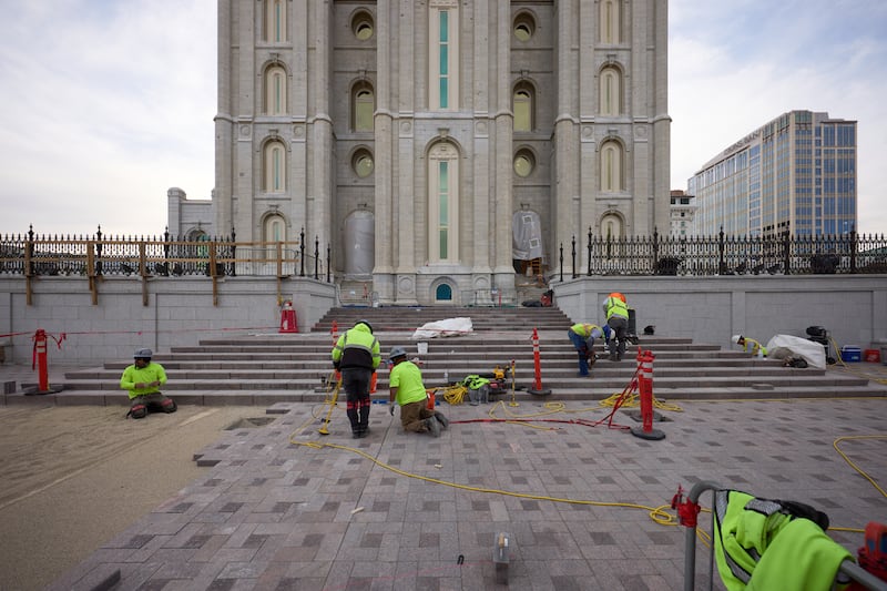Stone paving work is underway on the west towers of the Salt Lake Temple on Tuesday, April 21, 2026, in Salt Lake City.