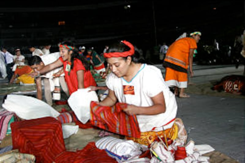 Young actors depict traditional market scene. Countless hours were spent preparing costumes for the
