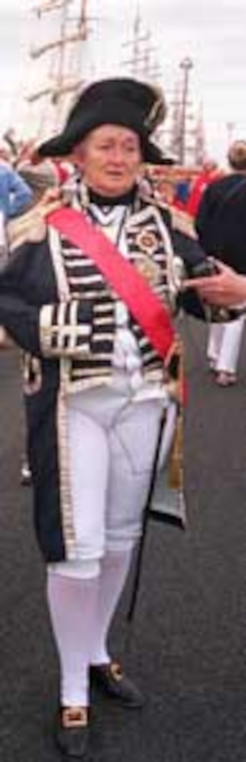 Constable in period costume patrols crowds prior to arrival of Sea Trek ships in Hull, England.