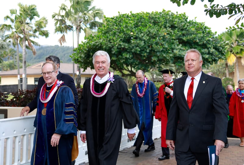 Elder Dieter F. Uchtdorf of the Quorum of the Twelve Apostles walks with BYU-Hawaii President John S. Tanner prior to BYU-Hawaii commencement on Dec. 14.