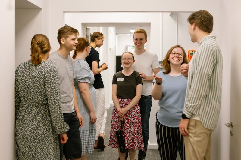 Young adults gather at the new Frankfurt Institute of Religion in Frankfurt, Germany, on June 27, 2026.