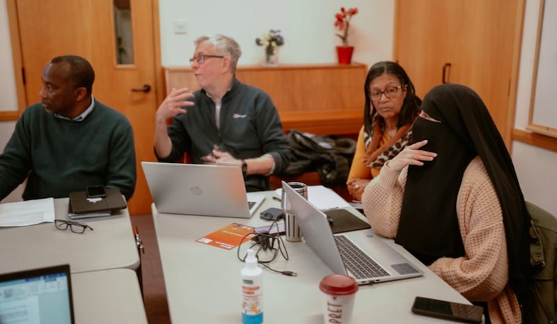 Members of the Brent Multi-faith Forum gather for one of their monthly meetings at the Wembley Friendship and Outreach Center.