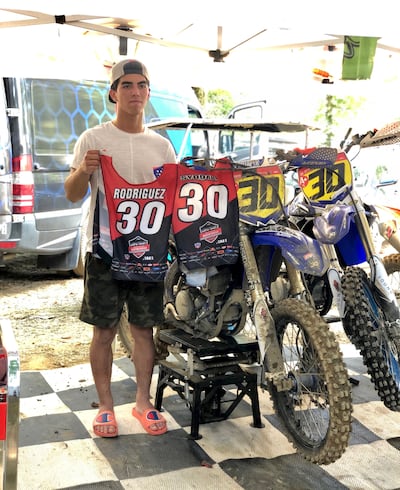 Utah motocross rider Rene Rodriguez holds up the No. 30 in honor of his deceased friend, Hunter Syddall, after competing on his behalf at the The 38th Annual Rocky Mountain ATV/MC AMA Amateur National Motocross Championship last week the at Loretta Lynn Ranch in Tennessee.