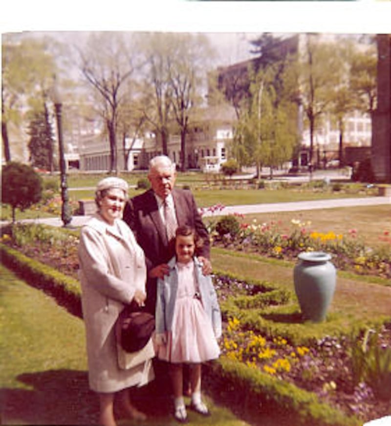 Linda Kjar Burton, age 6, on Temple Square with her Grandpa Kjar and Grandma Eva.