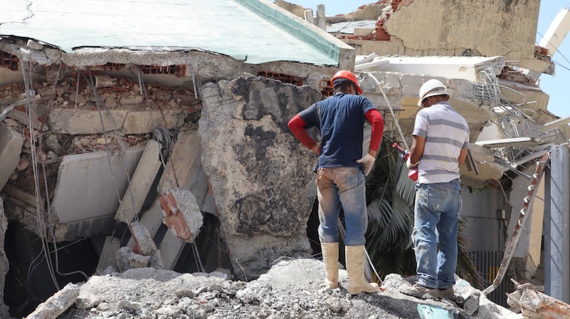 Workers search through rubble in La Guaira, Venezuela, on June 29, 2026.
