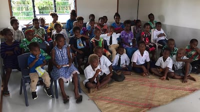 Children in Vanuatu view the October 2020 general conference where President Russell M. Nelson announced plans to build a temple in their island nation.