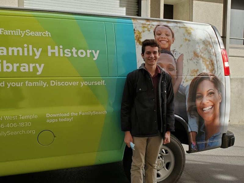 Luke Morrison, 16, poses for a photo in front of the Family History Library van in Salt Lake City, Utah, on Oct. 14, 2020.