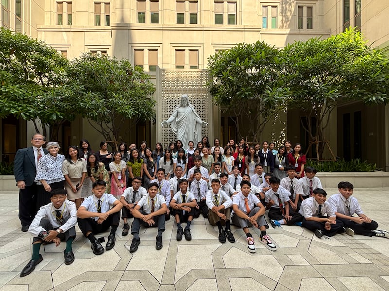 Youth from Indonesia pose for a photo outside the Bangkok Thailand Temple while visiting the grounds Dec. 17-18, 2025.