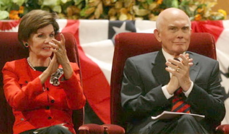 Elder Dallin H. Oaks of the Quorum of the Twelve and his wife, Sister Kristen Oaks, applaud a musica