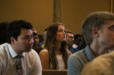 Students, faculty and guests listen to Sister Liz Darger in the Assembly Hall at Temple Square for an LDSBC devotional on June 18, 2019.