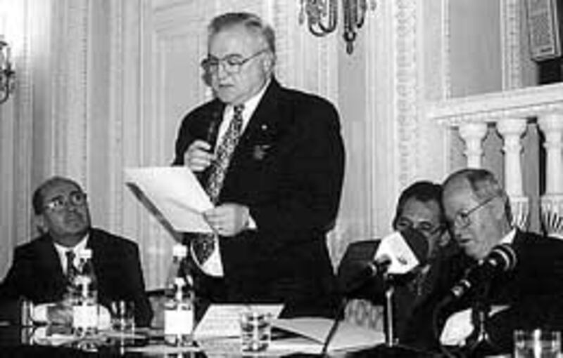 President Douglas F. Tobler of the Poland mission reads prepared remarks during presentation of the