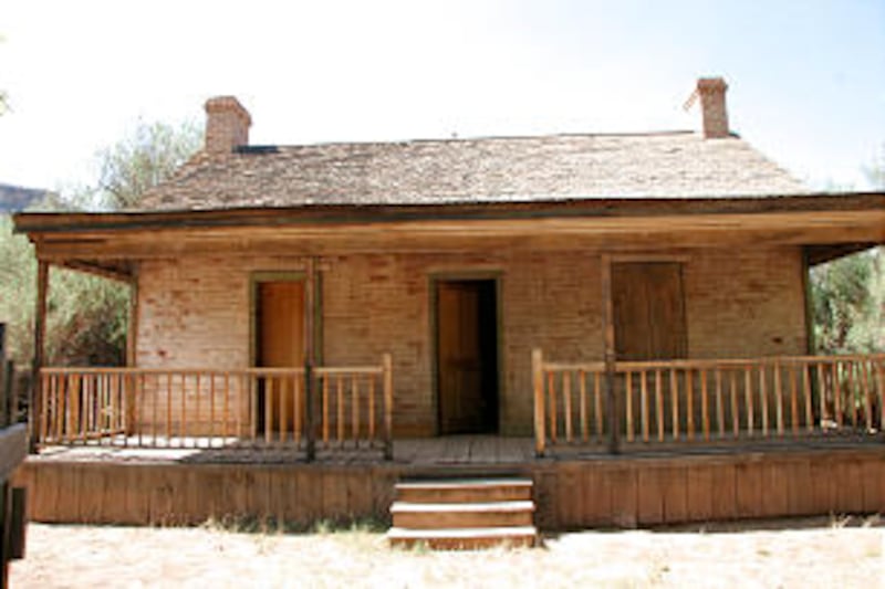 The John Wood Home was built out of soft-fired brick in 1877 by its namesake, a blacksmith and carpe