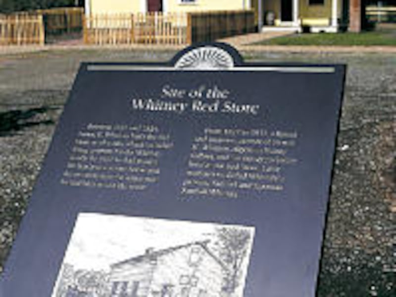 Plaque near Whitney home details contributions of Newel K. and Elizabeth Ann Whitney, early members