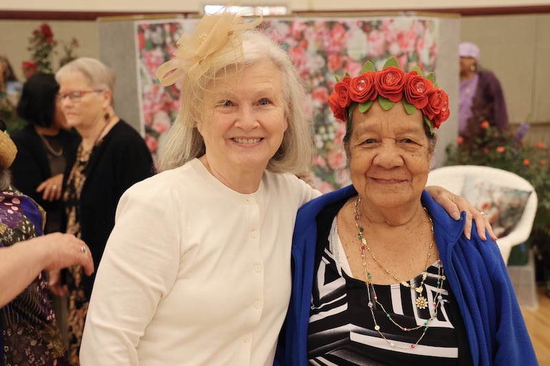 Myra Horonzy and Eiko John Alati take a picture together during a stake women's conference in Asheville, North Carolina.