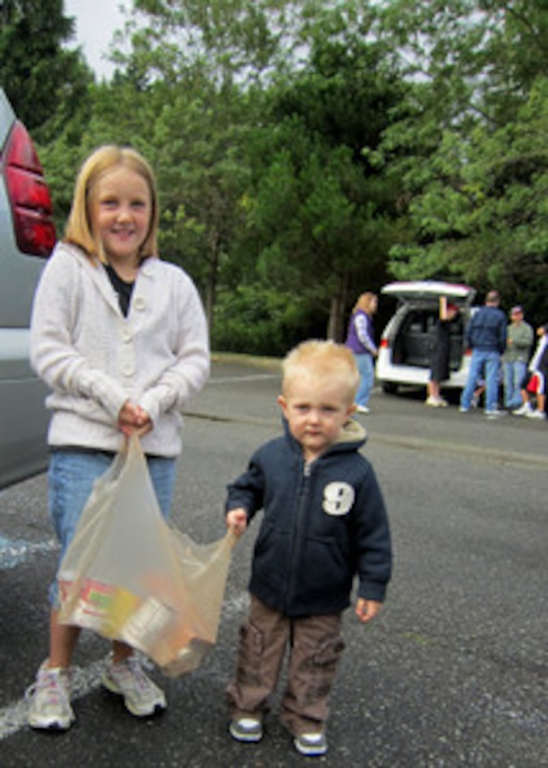 Children collect food drive donations in North Bend, Washington.