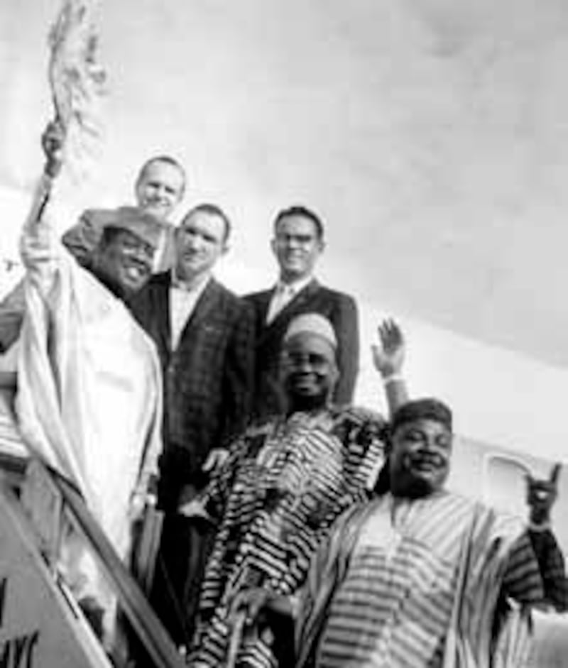 Nigerian officials played hosts to Marv Jenson, at top and his fighter, Gene Fullmer, step below, du