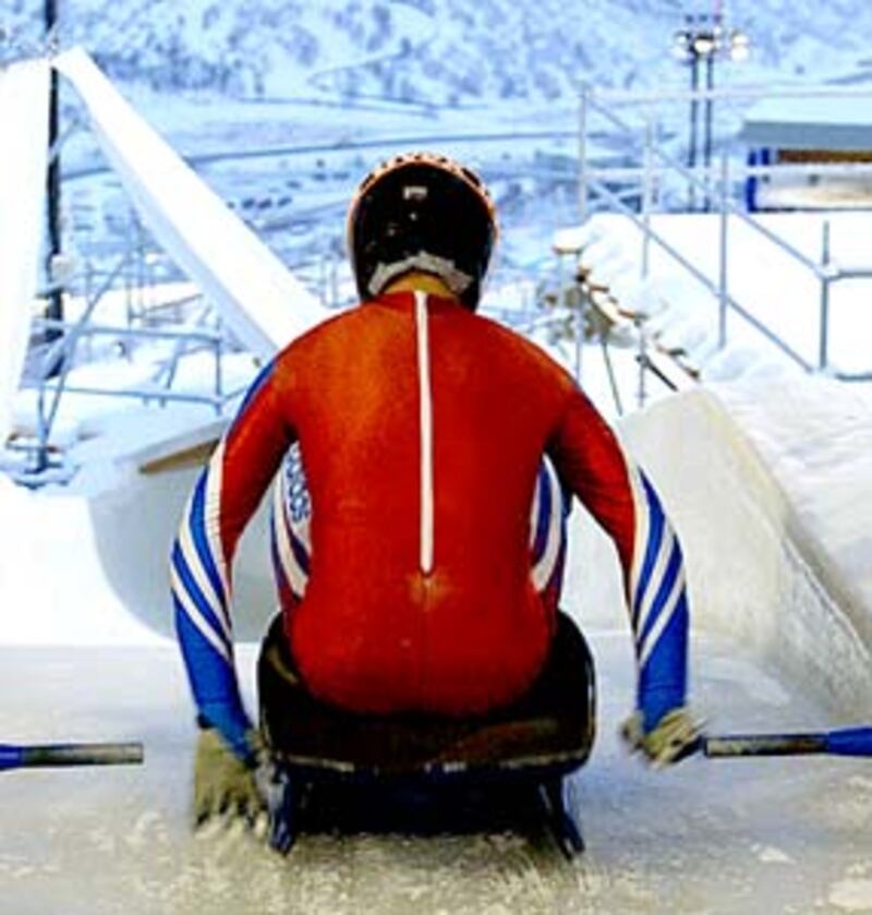 Chris Hoeger begins slide down luge track.