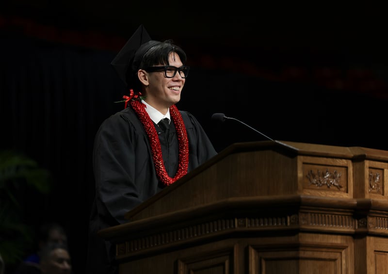 Manuarii Tefan, a BYU–Hawaii graduate from Tahiti, speaks during commencement held in the Cannon Activities Center in Laie, Hawaii, on Friday, Dec. 12, 2025.