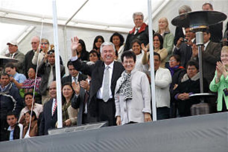 President Uchtdorf and Sister Harriet Uchtdorf wave to the Guatemalan performers.