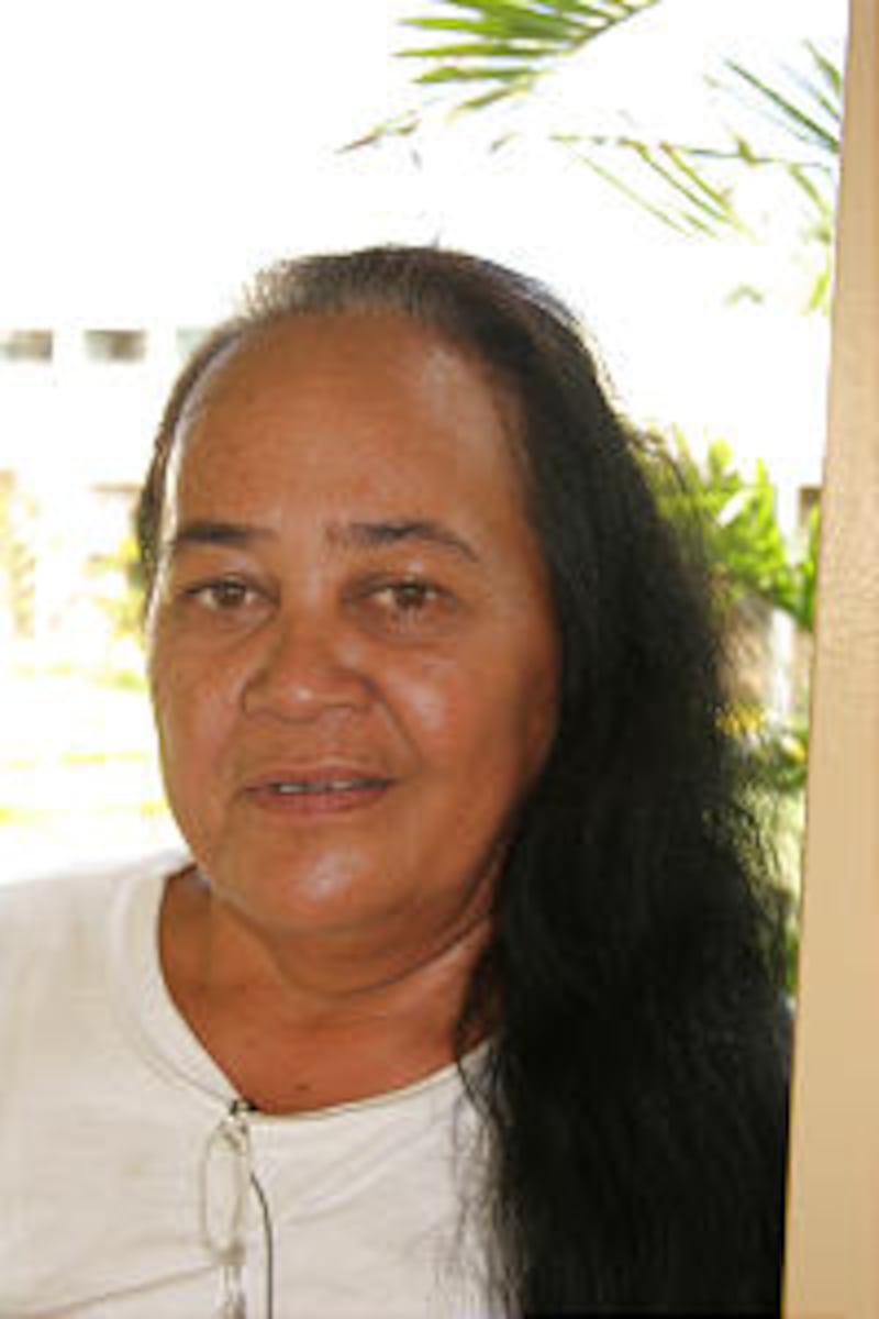 Dorina Pangsiang of the Auera Ward, Raromatau Tahiti Stake, right, has used her language skills to s