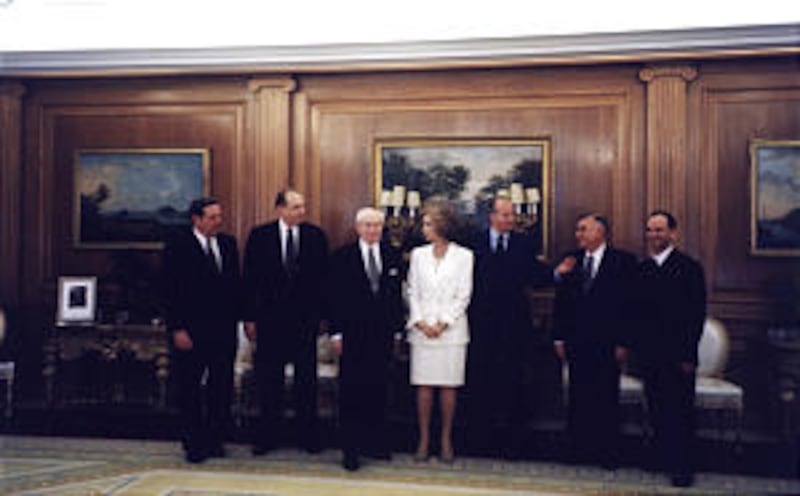 March 18, 1999: Elder Jeffrey R. Holland, left, President Thomas S. Monson of the First Presidency,