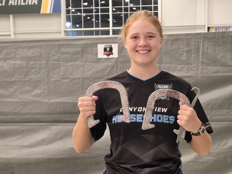 Adilaide Ohms, 18, holds up her horseshoes after winning the 2026 National Horseshoe Pitchers Association World Horseshoe Tournament on July 18, 2026.