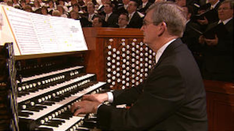 Organist John Longhurst accompanies the Tabernacle Choir on Saturday morning.