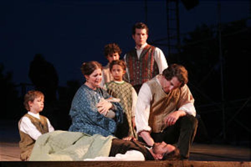 In scene from new Nauvoo pageant, Joseph Smith consoles Elijah Fordam and his family, prior to Josep