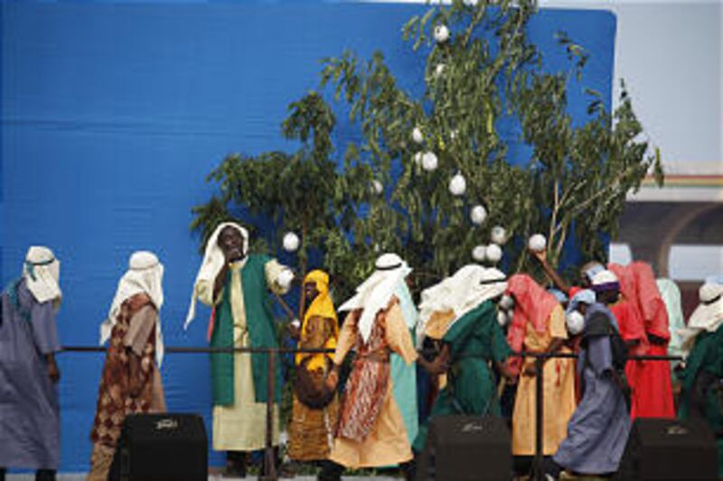 Youth portray Lehi inviting his family to partake of the fruit of the Tree of Life, an experience fo