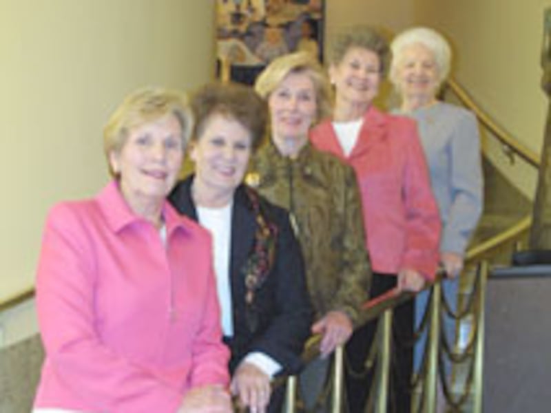 On stairs are, from left, Relief Society General President Bonnie D. Parkin, and former general pres