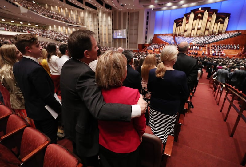 Attendees sing a congregational hymn during the 189th Annual General Conference of The Church of Jesus Christ of Latter-day Saints in Salt Lake City on Saturday, April 6, 2019.
