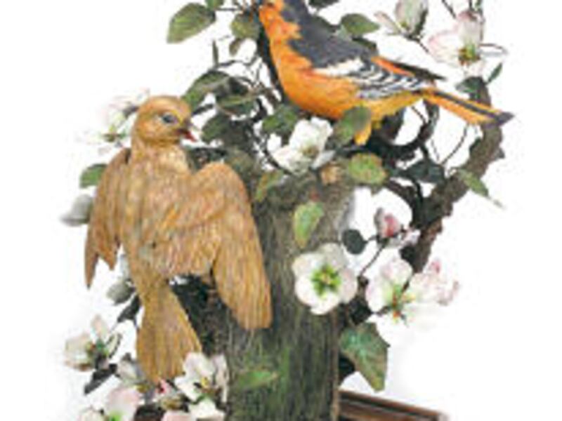 President Packer's "Pair of Bullocks, Apple Blossoms" is crafted from carved and annealed copper. T