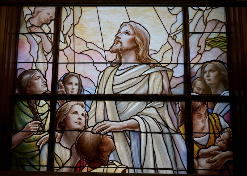Newly installed art glass depicting Jesus Christ adorns the north entrance buildings on Temple Square in Salt Lake City on Wednesday, March 11, 2026.