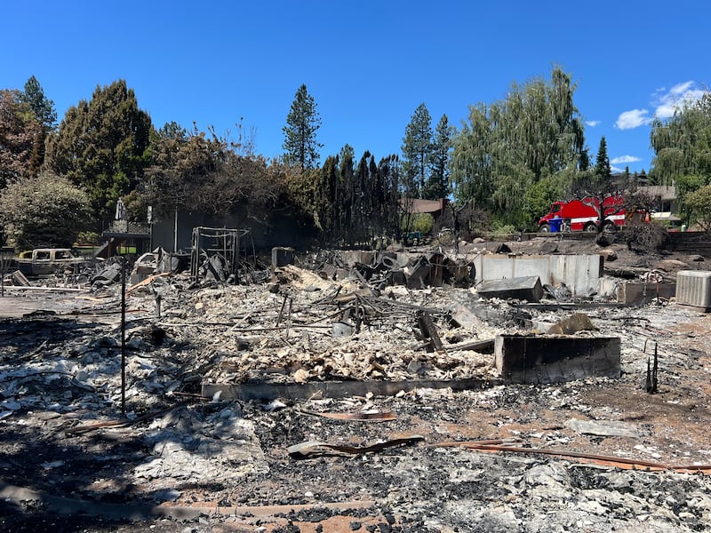 The view from the back of the property where the Anglesey family's home once stood before the Upriver Fire in Spokane, Washington, swept through on Tuesday, June 16, 2026.