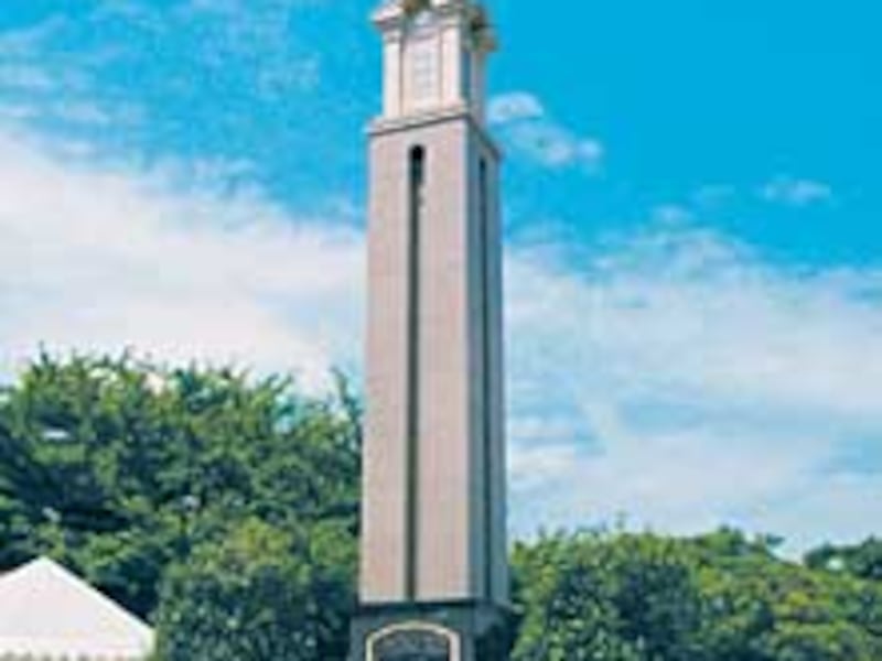Plaques commemorating the entry of the Church into Japan are placed at base of steeple that will be