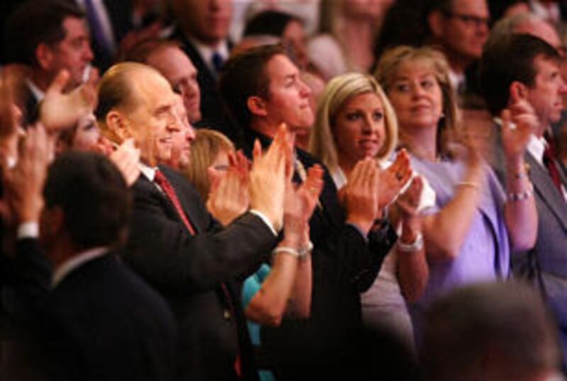 President Thomas S. Monson, with members of his family, joins in standing ovation for performers in