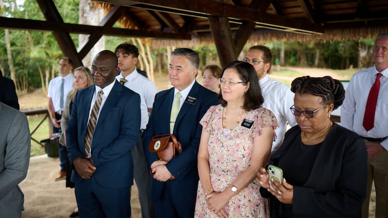 Kenya Nairobi East Mission President David T. Onekawa and his wife, Sister Lenise Onekawa, center, listen at a devotional in Seychelles on Oct. 27, 2025.