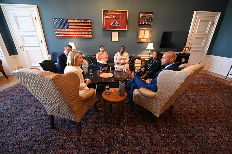 President Camille N. Johnson and Maryland Governor Wes Moore speak in his office in Annapolis, Maryland, on Friday, May 15, 2026. With them are Elder Michael P. Brady, Bente Uhlig, Sister Eme Martin, and Lora Hargrove.