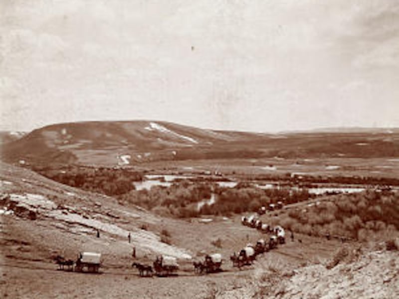 Pioneers to the Big Horn Basin in Wyoming in 1900 gather at Kemmerer in preparation to travel to are