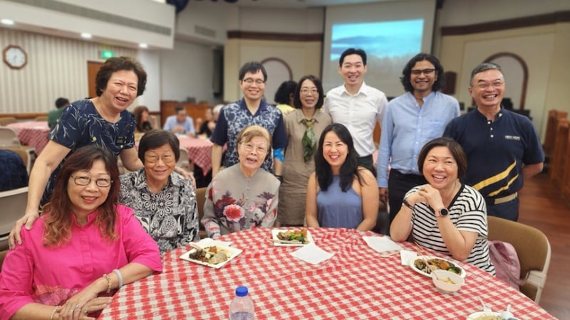 Friends from Centre of Interfaith Understanding, SengKang Central Harmony Circle, and members of The Church of Jesus Christ of Latter-day Saints pose with Singapore Stake President Christian Hsieh and his wife, back center, at the interfaith dinner on June 12, 2026, Singapore.