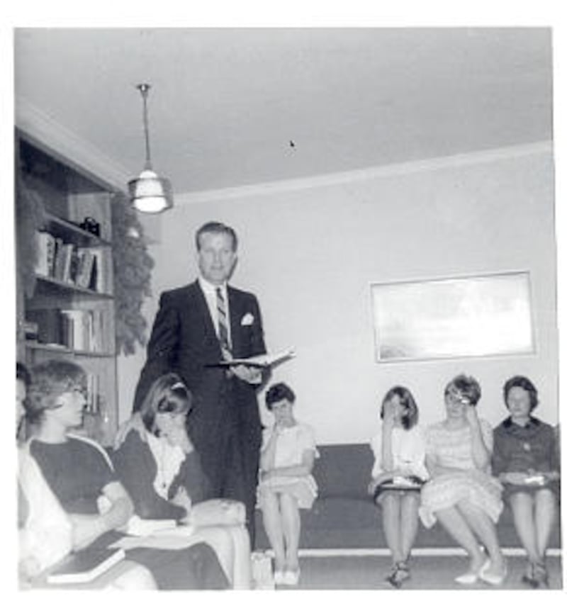 Pres. Morris A. Kjar reaches out to teenage daughter, Linda, during fireside on Christmas Eve 1966 i