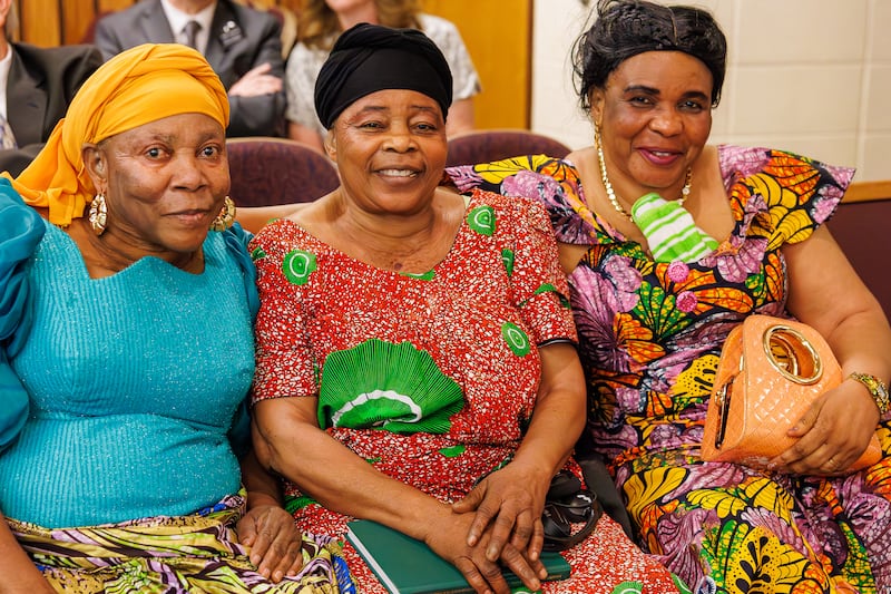 Three women prepare for church meetings to begin on the day the Treasure Valley Ward (Swahili) was created in Boise, Idaho, Sunday, Feb. 8, 2026.