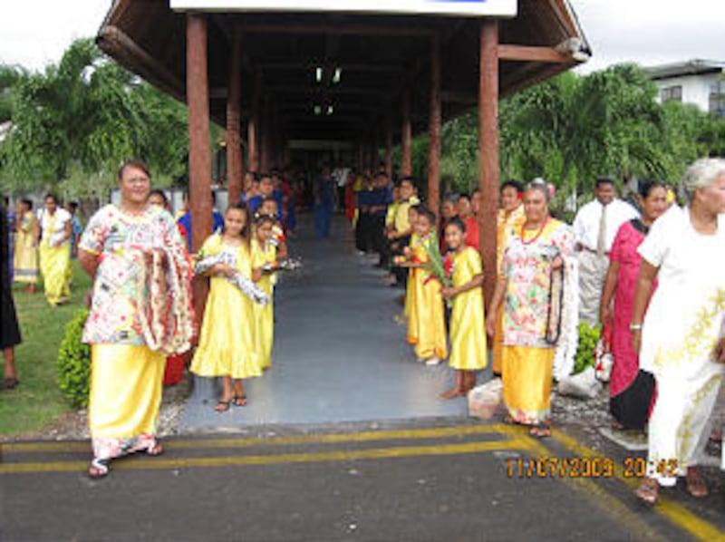 Members line up at the Samoa airport in anticipation of the arrival of President Dieter F. Uchtdorf