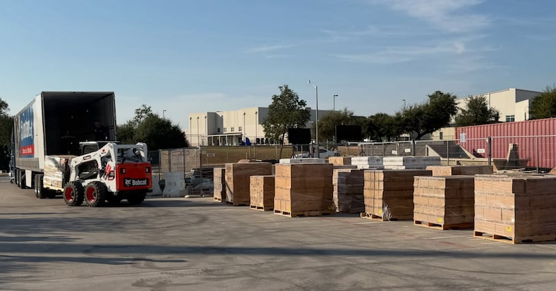 Pallets full of donated food from The Church of Jesus Christ of Latter-day Saints are unloaded outside the under-construction Austin Texas Temple for volunteers to sort through it for local food pantries in Cedar Park, Texas, on Wednesday, Sept. 23, 2026.