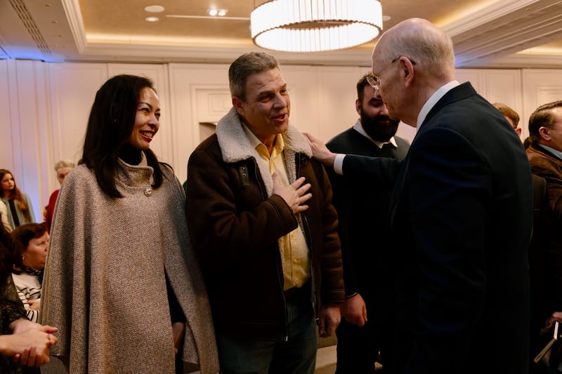 Elder Dale G. Renlund of the Quorum of the Twelve Apostles speaks with Popescu Azota from the NGO Association Catharsis Braşov at the Romania Bucharest District Conference on Feb. 22, 2026.