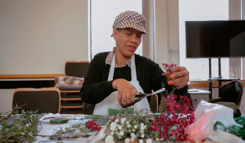 Lorraine Mederick participates in the beginning commercial floristry class in February 2024 at the Wembley Friendship and Outreach Center.